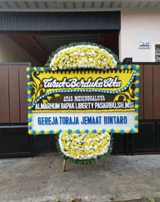 Papan Bunga Duka di Panunggulan